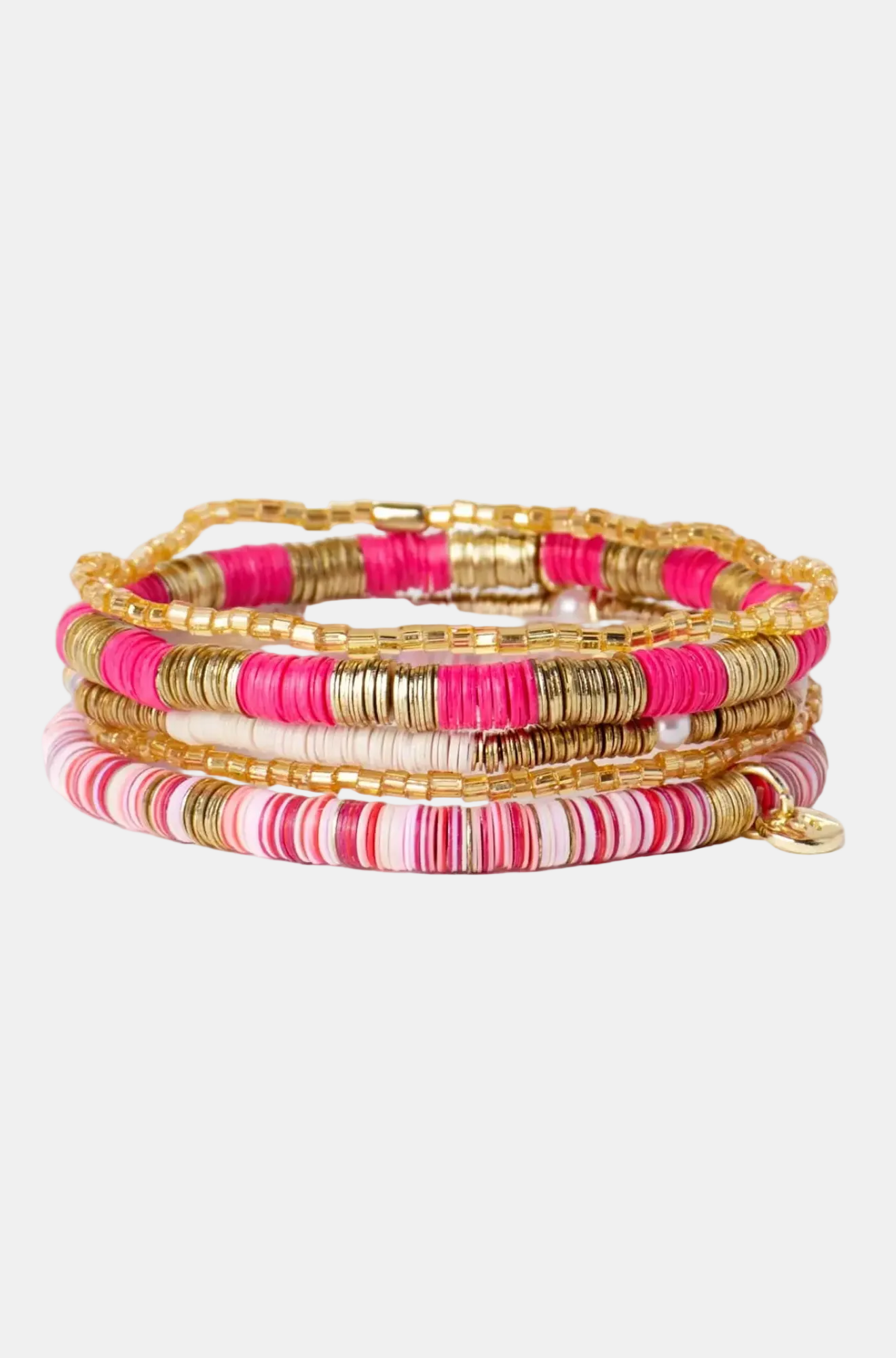 Stack of colorful beaded bracelets on a white background