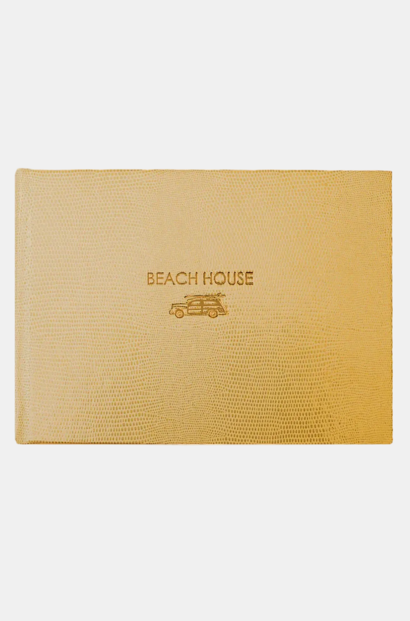 Beige leather-bound notebook with 'Beach House' embossed on it.