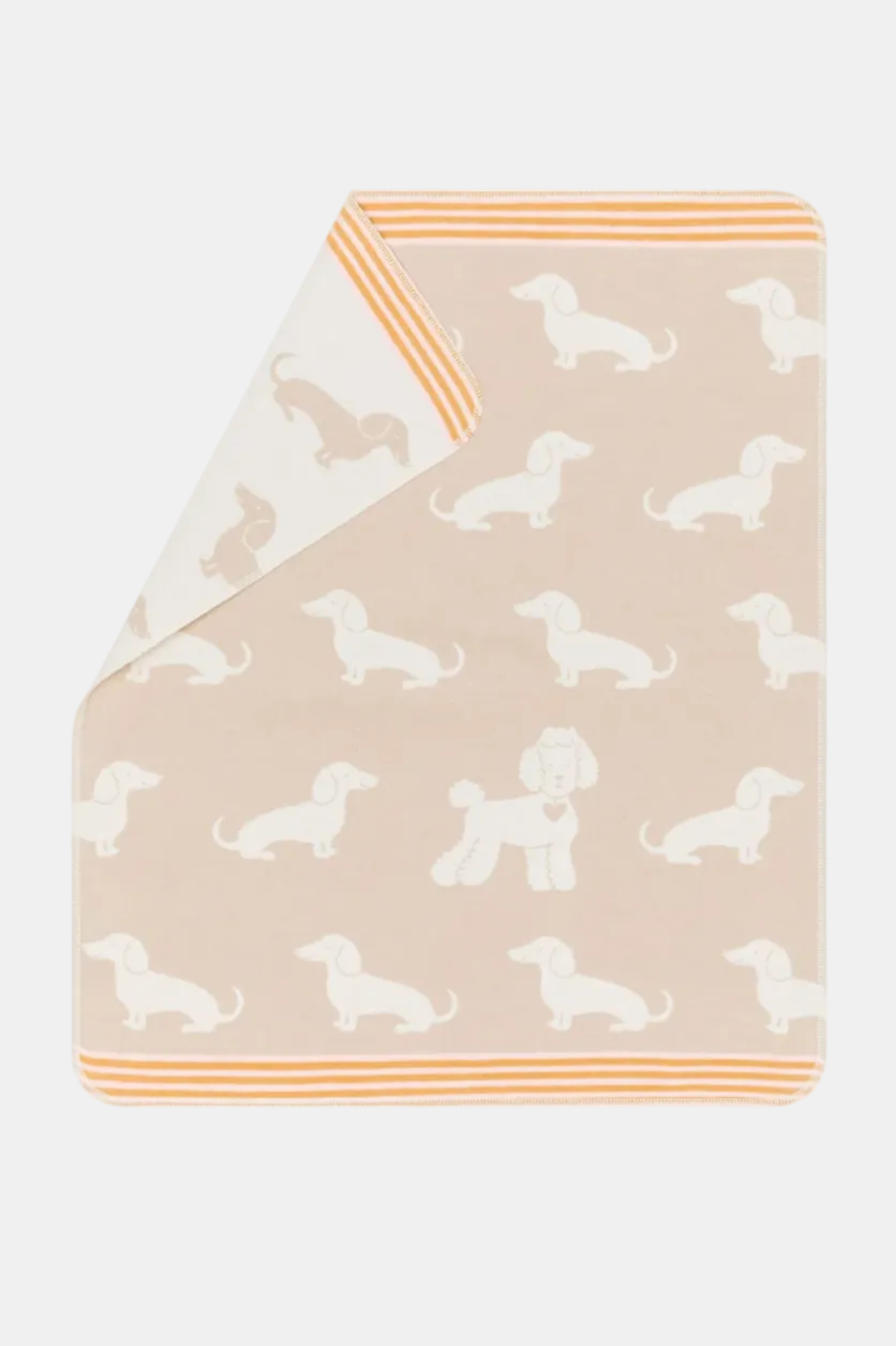 Blanket with dog pattern on a beige background
