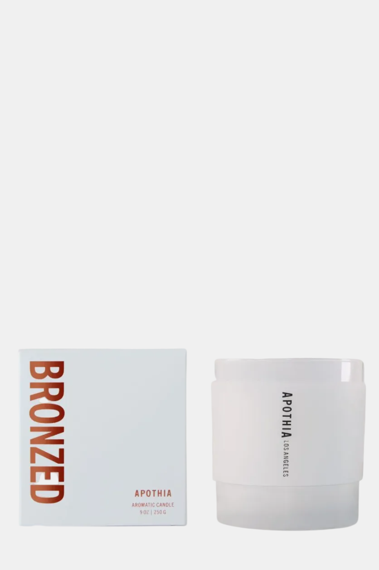 Apothia Bronzed candle and packaging on a white background
