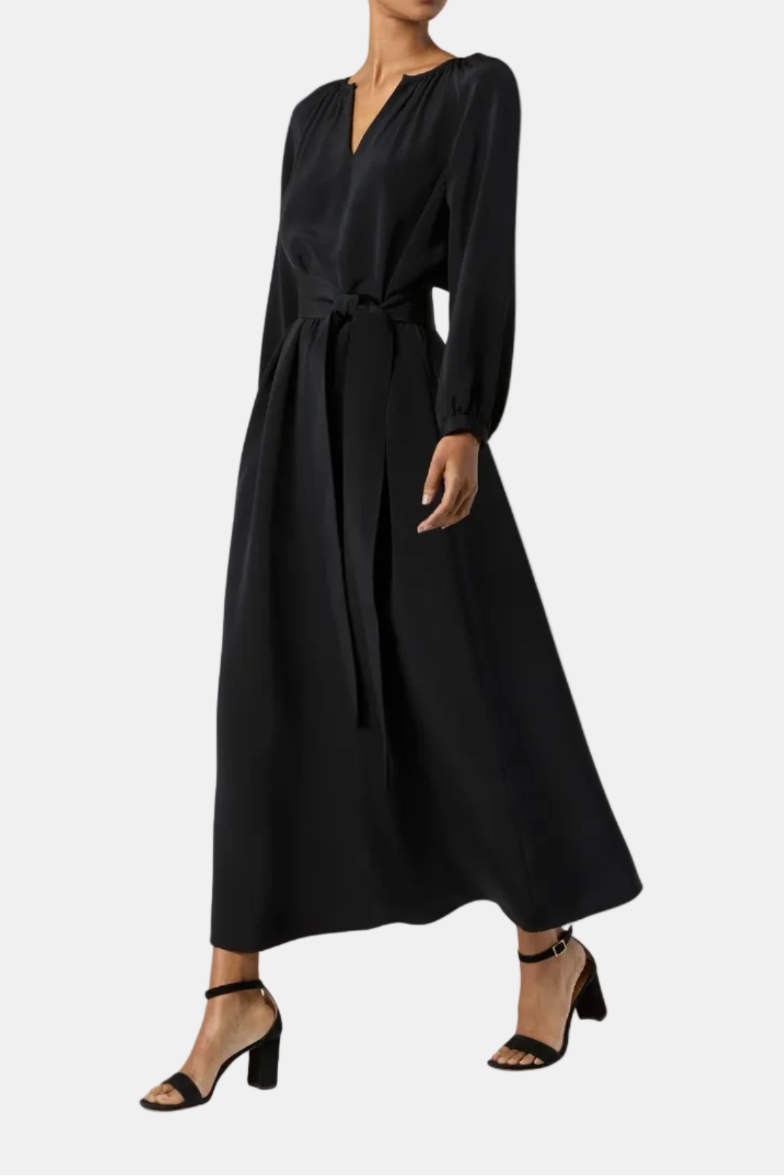 Woman wearing a black dress on a white background