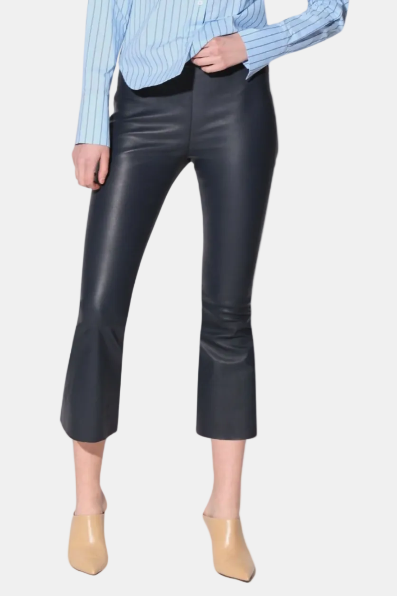 A pair of black Luisa Pant crop flare silhouette leather pants with a model standing against a white background.