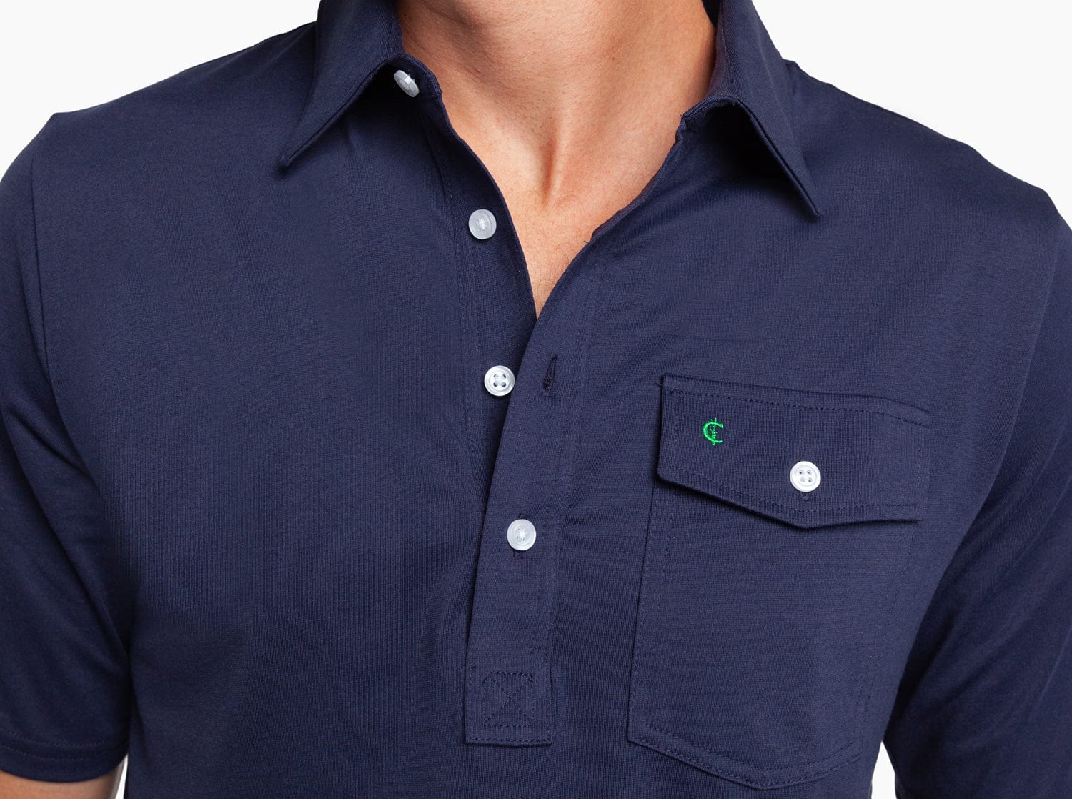 Navy blue polo shirt with a pocket and buttons on a white background