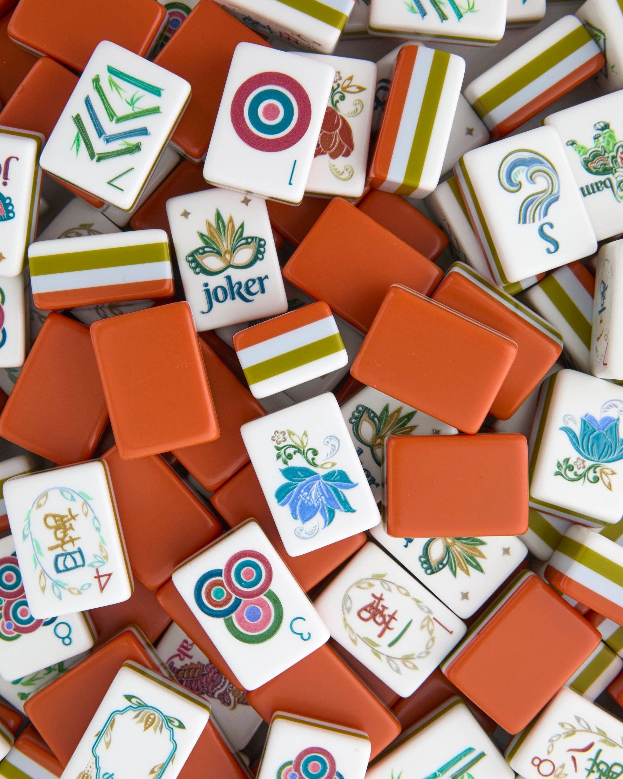 Collection of colorful Mahjong tiles with various designs and symbols.