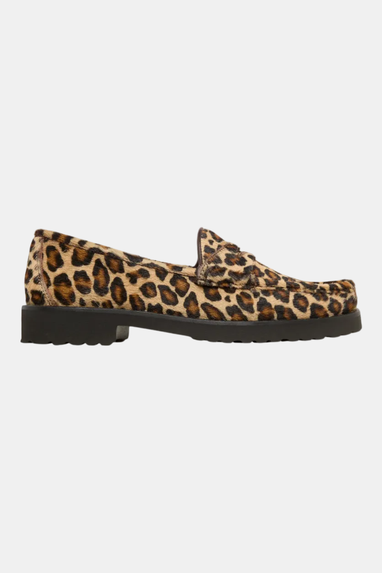 Leopard print loafers on a white background