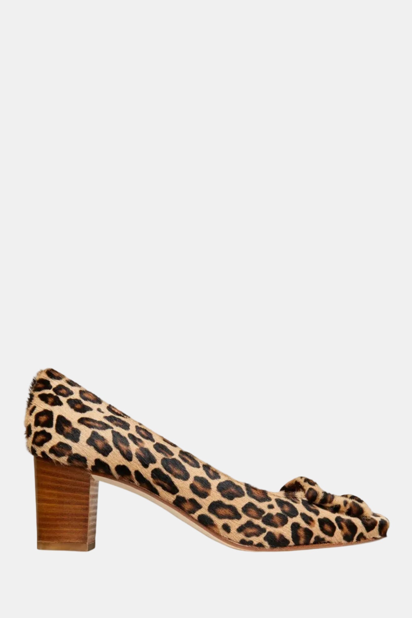 A leopard print pump with a higher heel and covered buckle, on a white background.