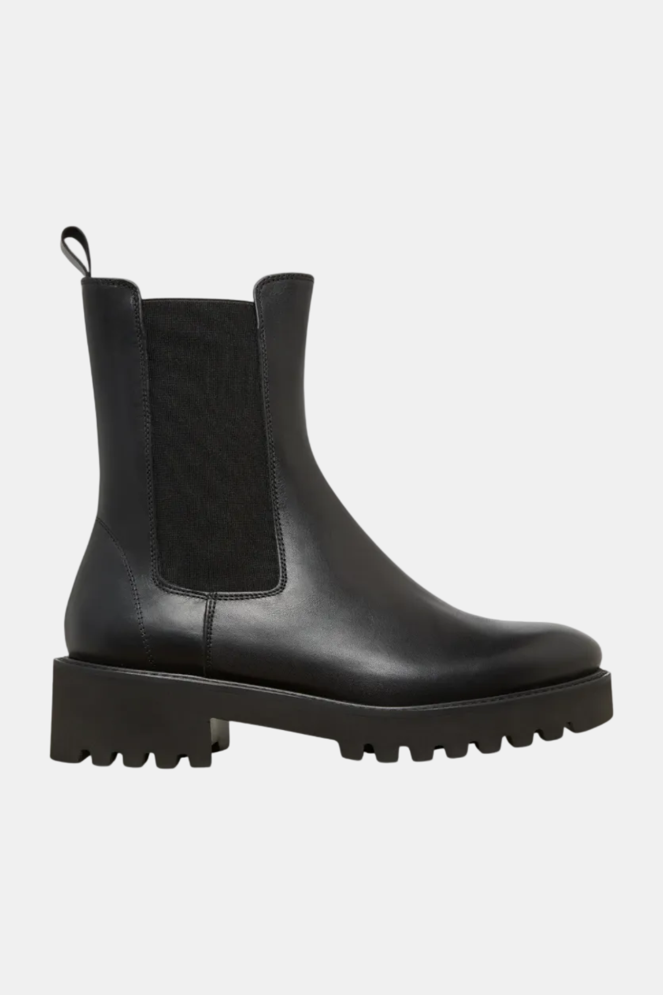 Black Chelsea boot on a white background