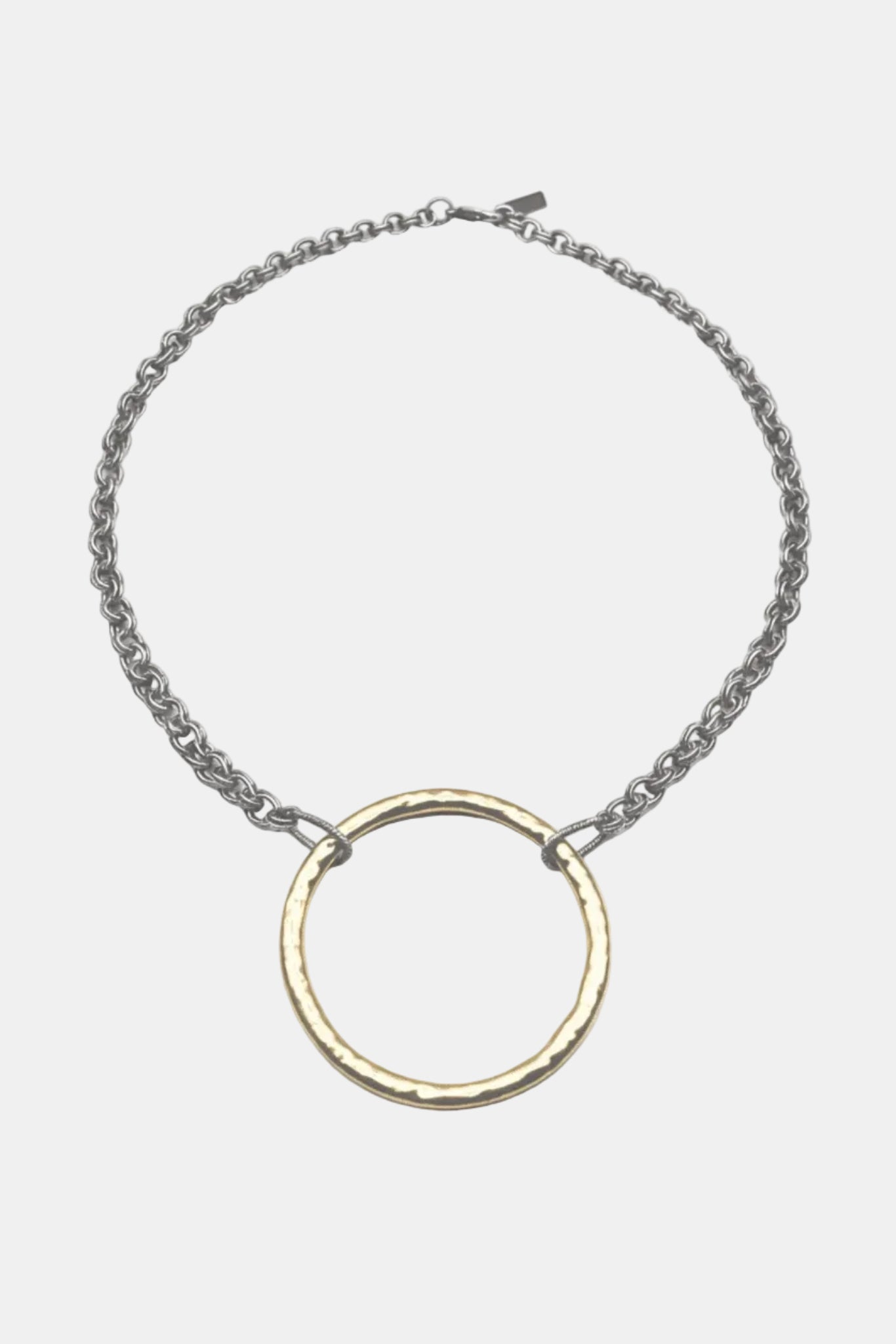 Necklace with a gold ring pendant on a white background