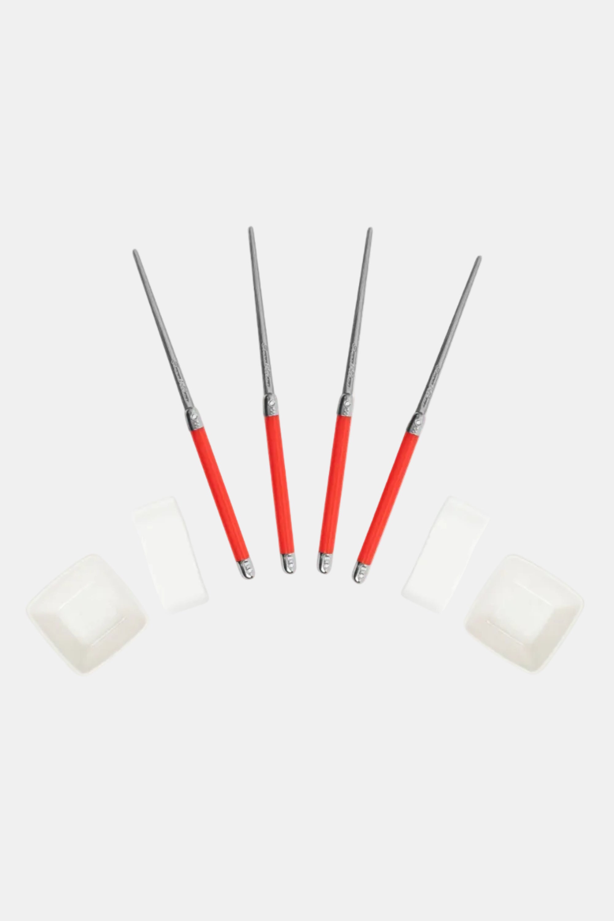 Set of five paint rollers with red handles and white foam ends on a white background