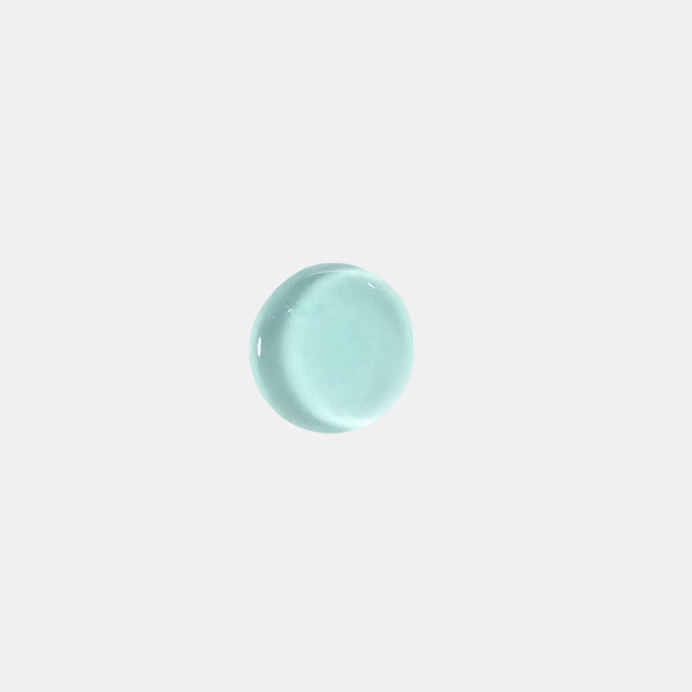 Light blue circular object on a white background