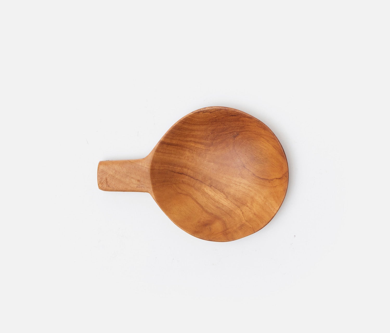 A single wooden spoon with a rounded bowl and short handle, shown from above on a plain white background.