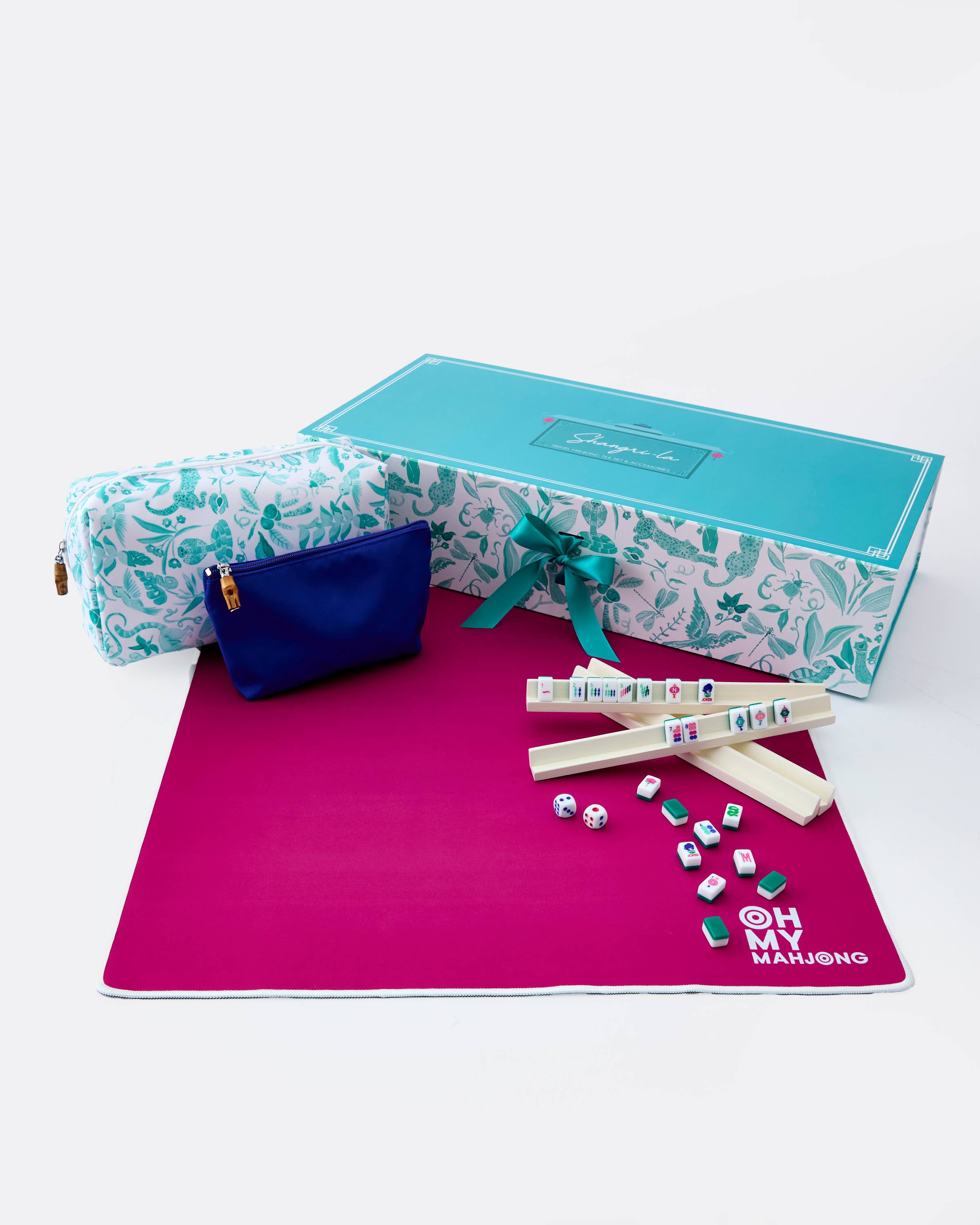 Marble-patterned pouch, blue dice cup, and maroon mat with 'Oh My! Mahjong' branding on a white background.