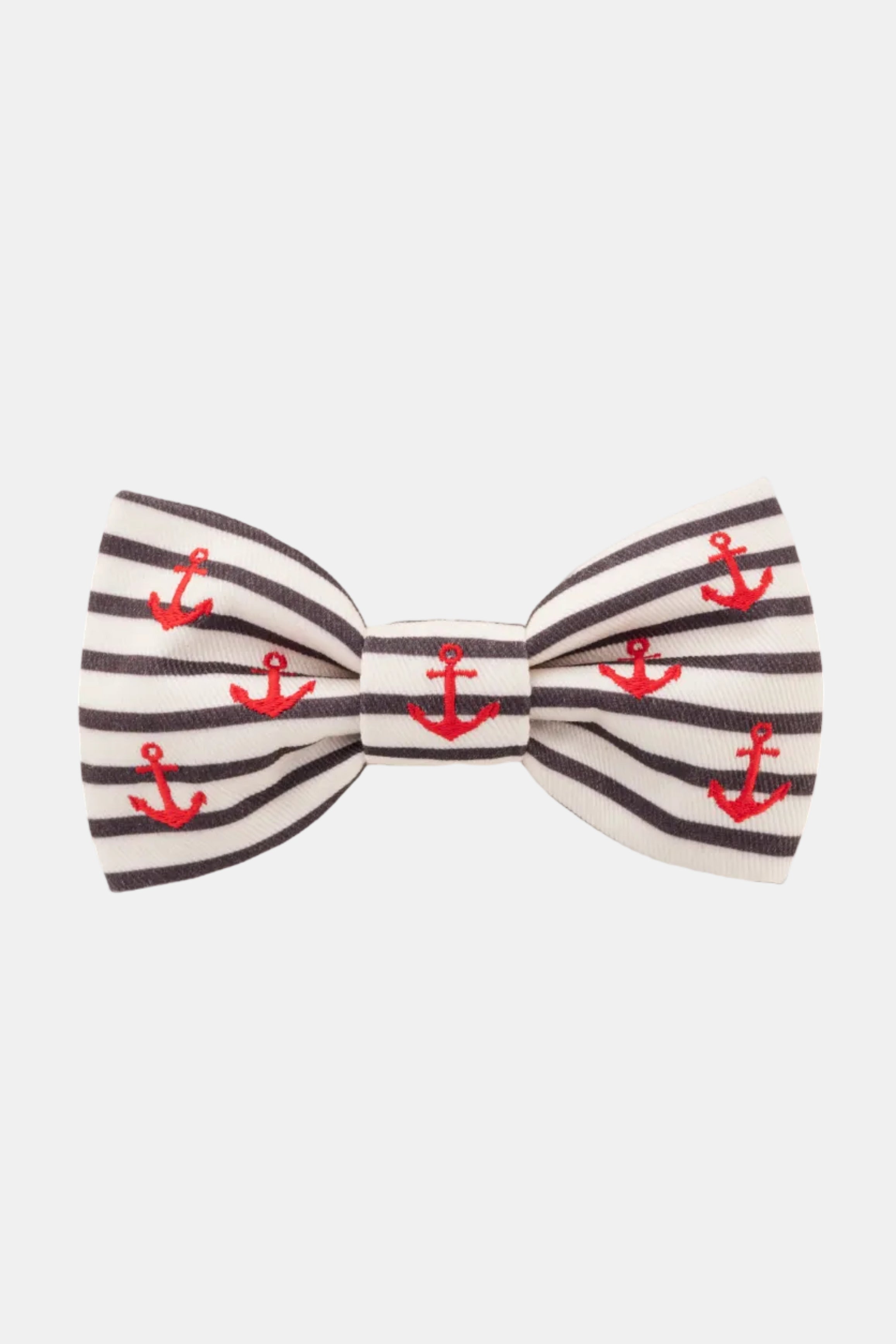 Striped bow tie with red anchor pattern on a white background