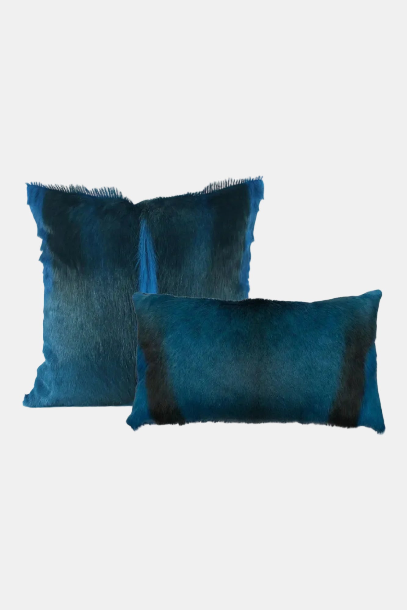 Two blue pillows with a gradient effect on a white background
