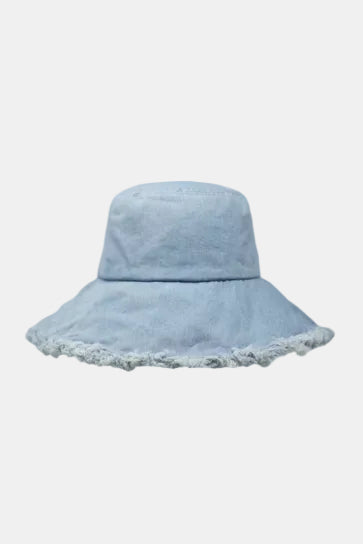 Light blue denim bucket hat with frayed edge on a white background