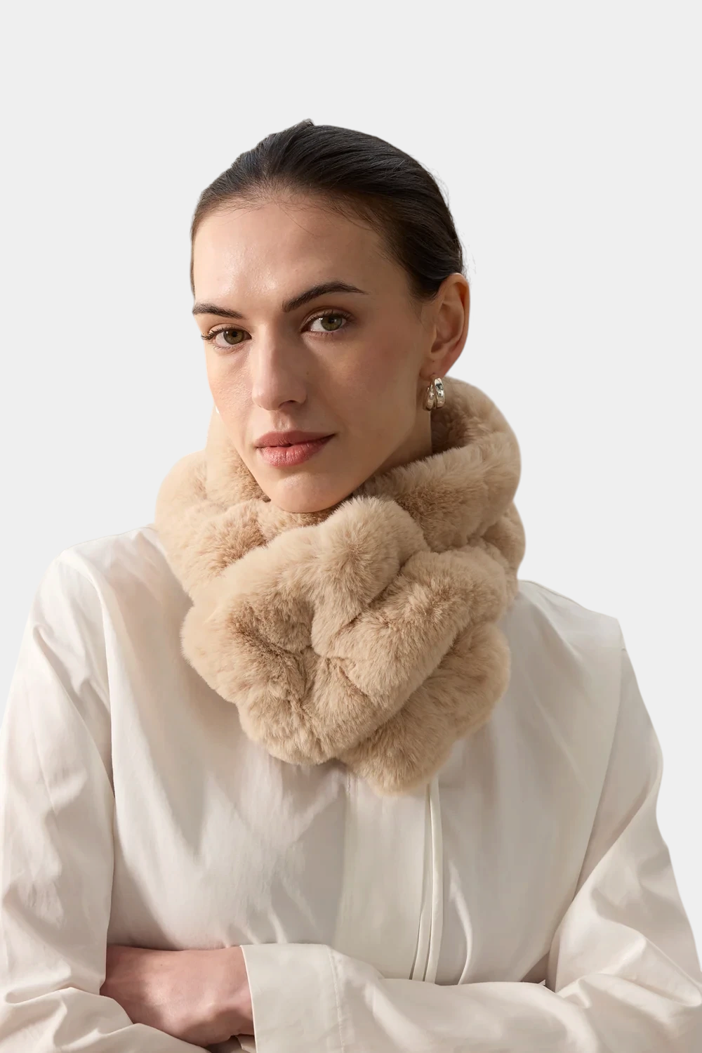 The Copper Shed beige faux fur ruffle scarf with a stretch-gathered design and elasticated loop for easy wear.