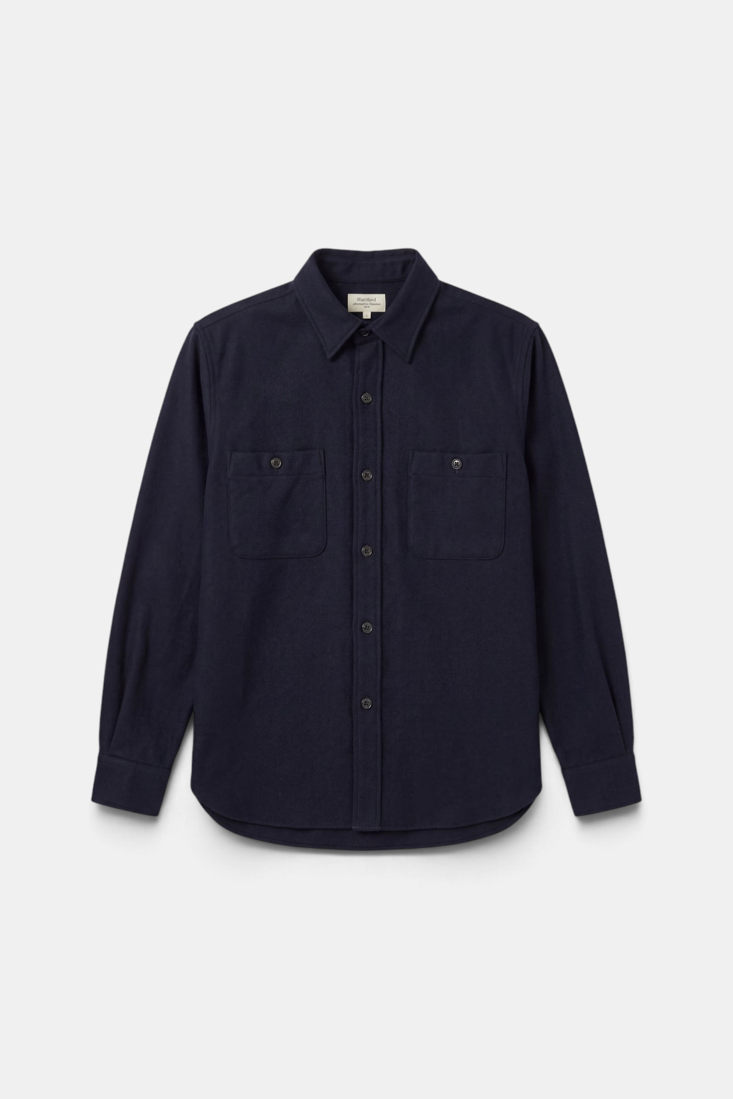 The Copper Shed navy blue boiled wool flannel shirt with a classic collar and two buttoned chest pockets.