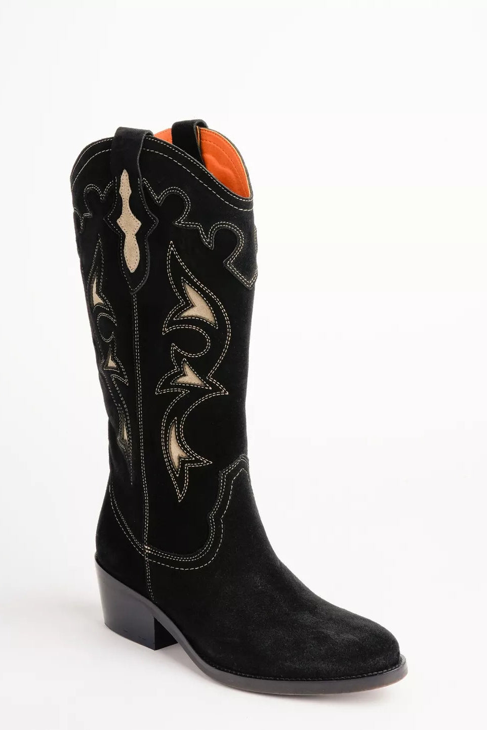 Black cowboy boot with intricate white stitching on a white background