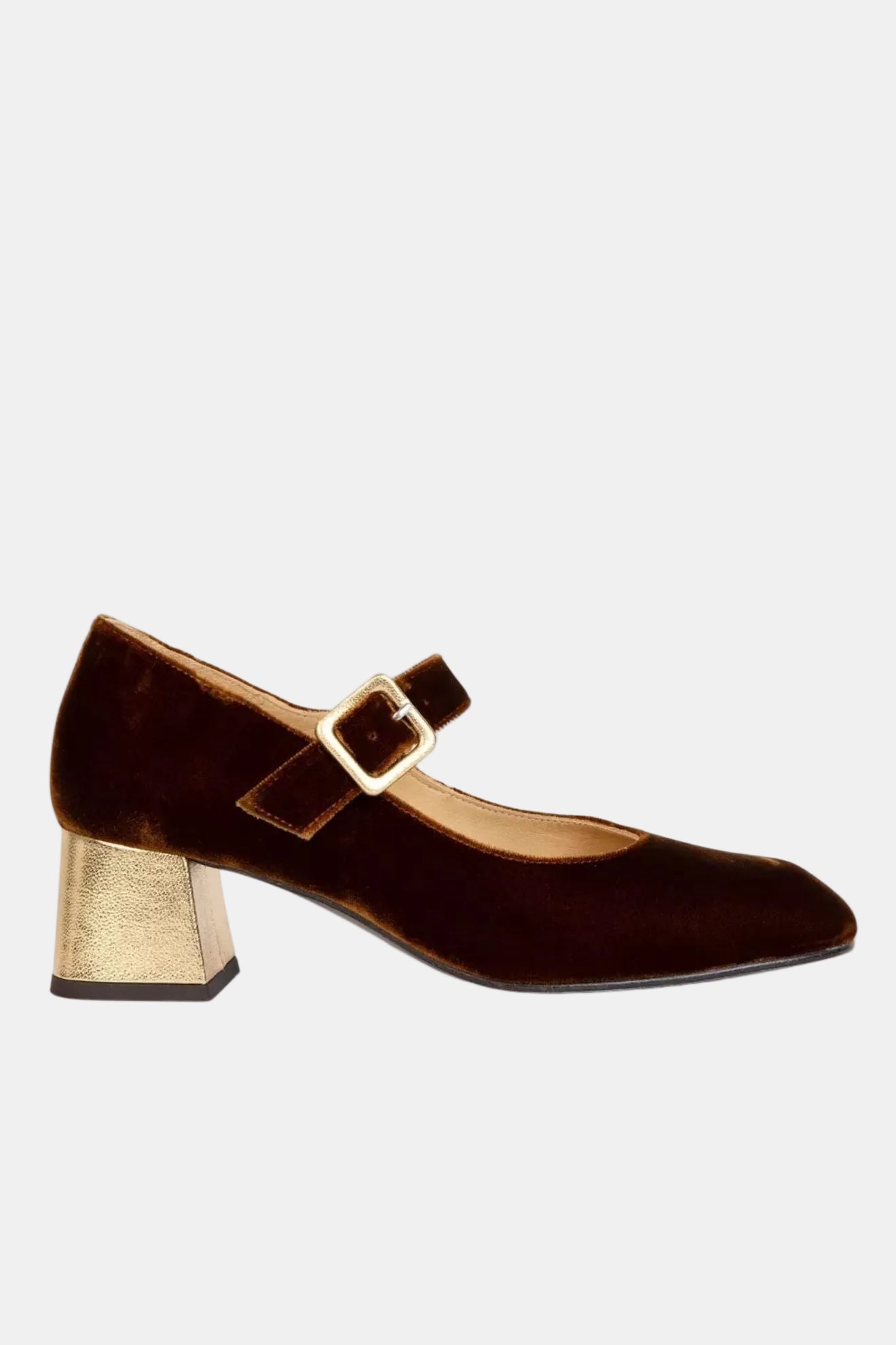 A brown velvet Mary Jane shoe with a mid-height heel and a buckle strap across the foot.