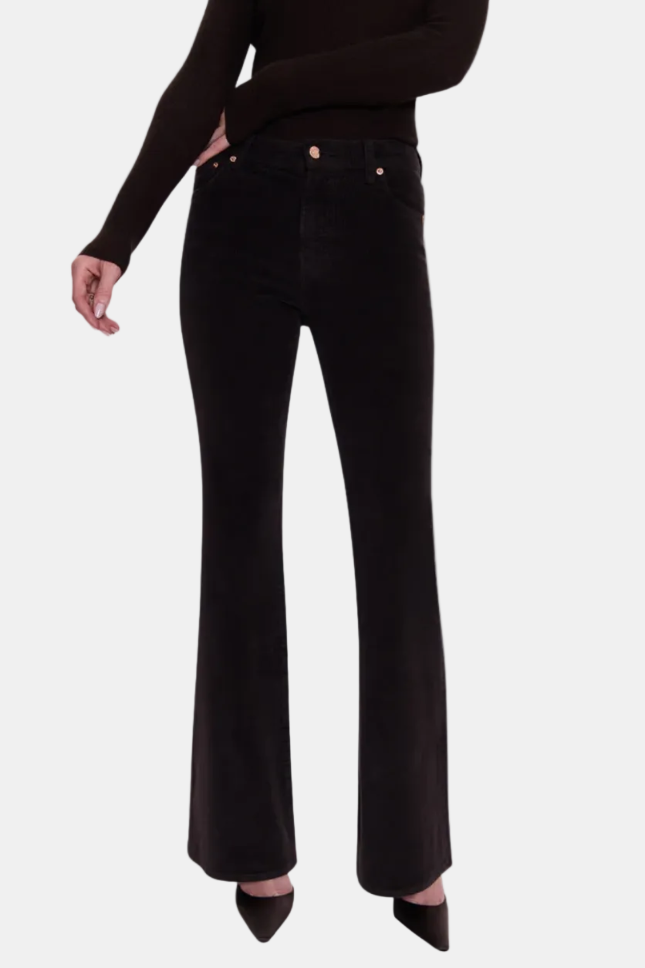 Black pants worn by a person on a white background