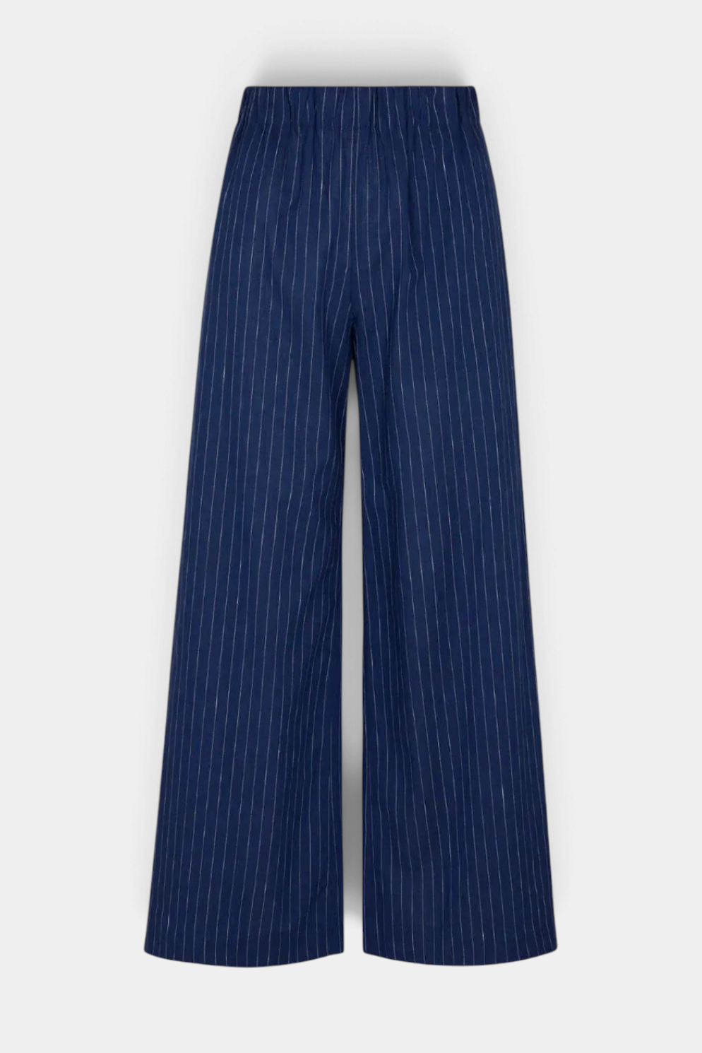 The Copper Shed Abby beach pants in navy blue cotton linen blend with vertical white stripes and elastic waistband