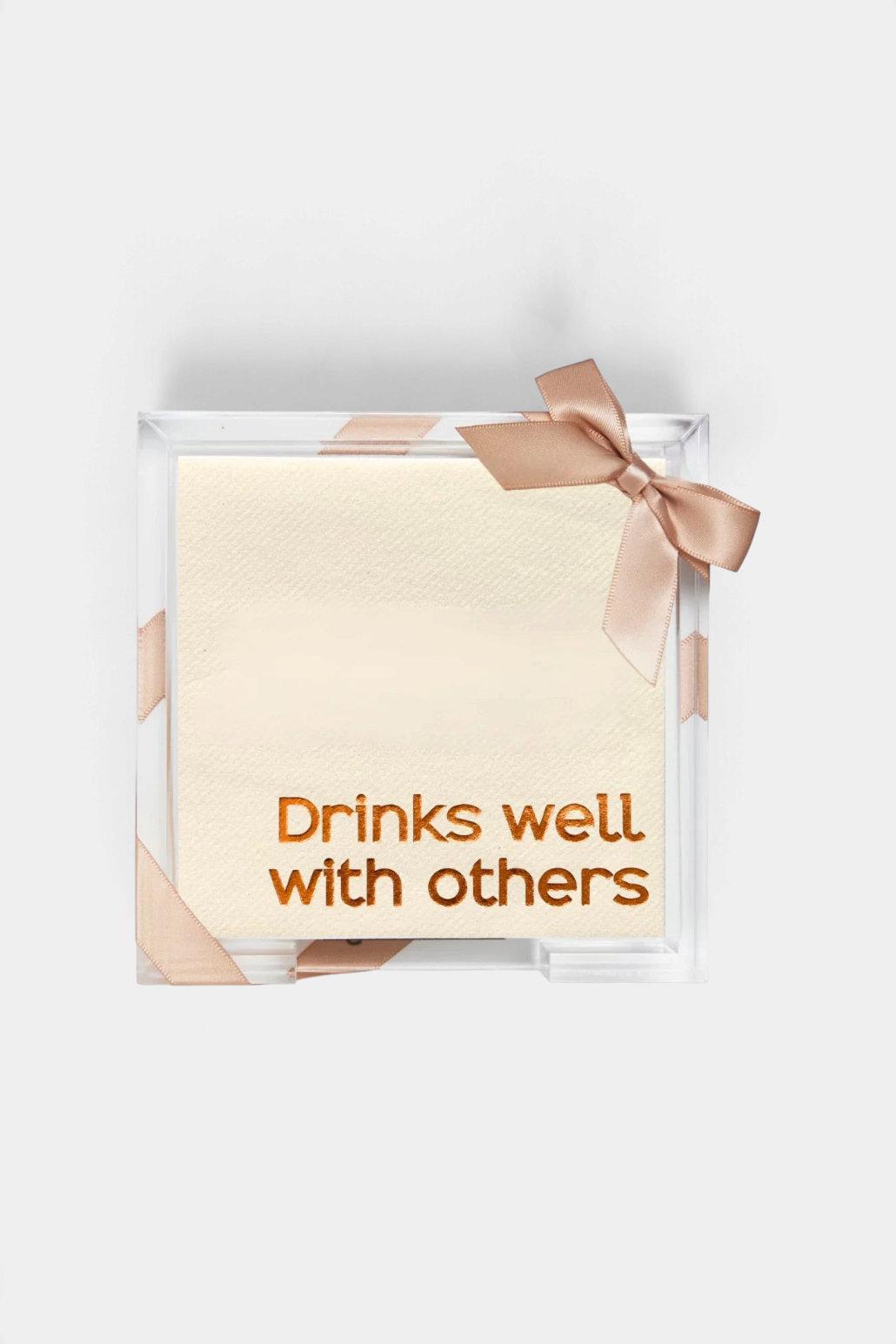 The Copper Shed clear acrylic tray holding guest towels with gold foil text Drinks well with others and a silk bow