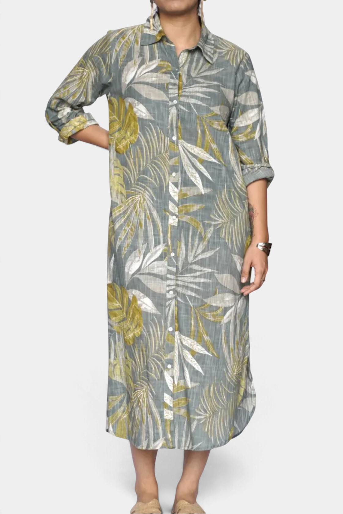 The Copper Shed Alessia Geo Dress in a grey and olive leaf print, featuring a button-down front and convertible sleeves