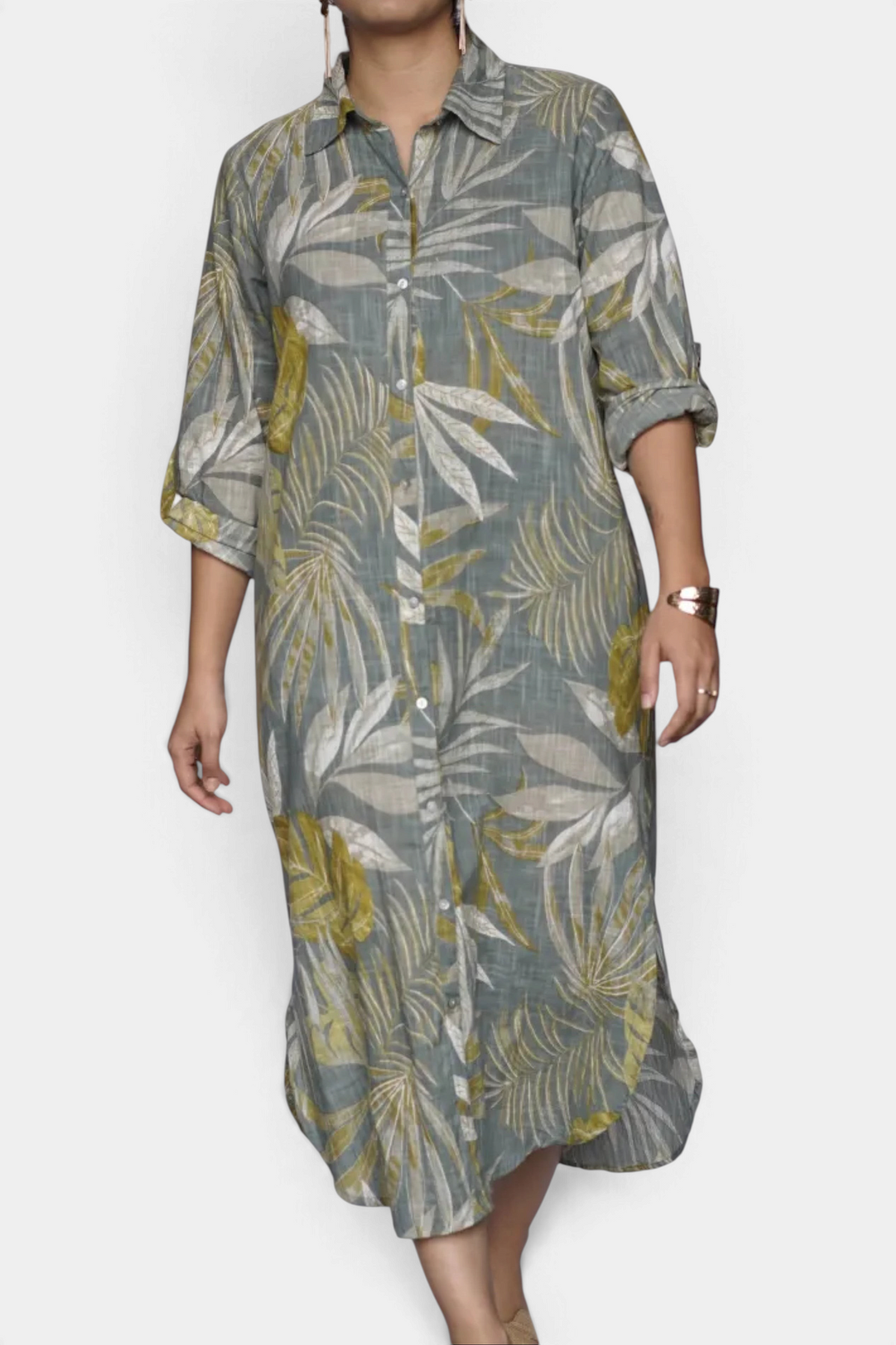 The Copper Shed Alessia Geo Dress in a grey and olive leaf print cotton with button-front and convertible sleeves.