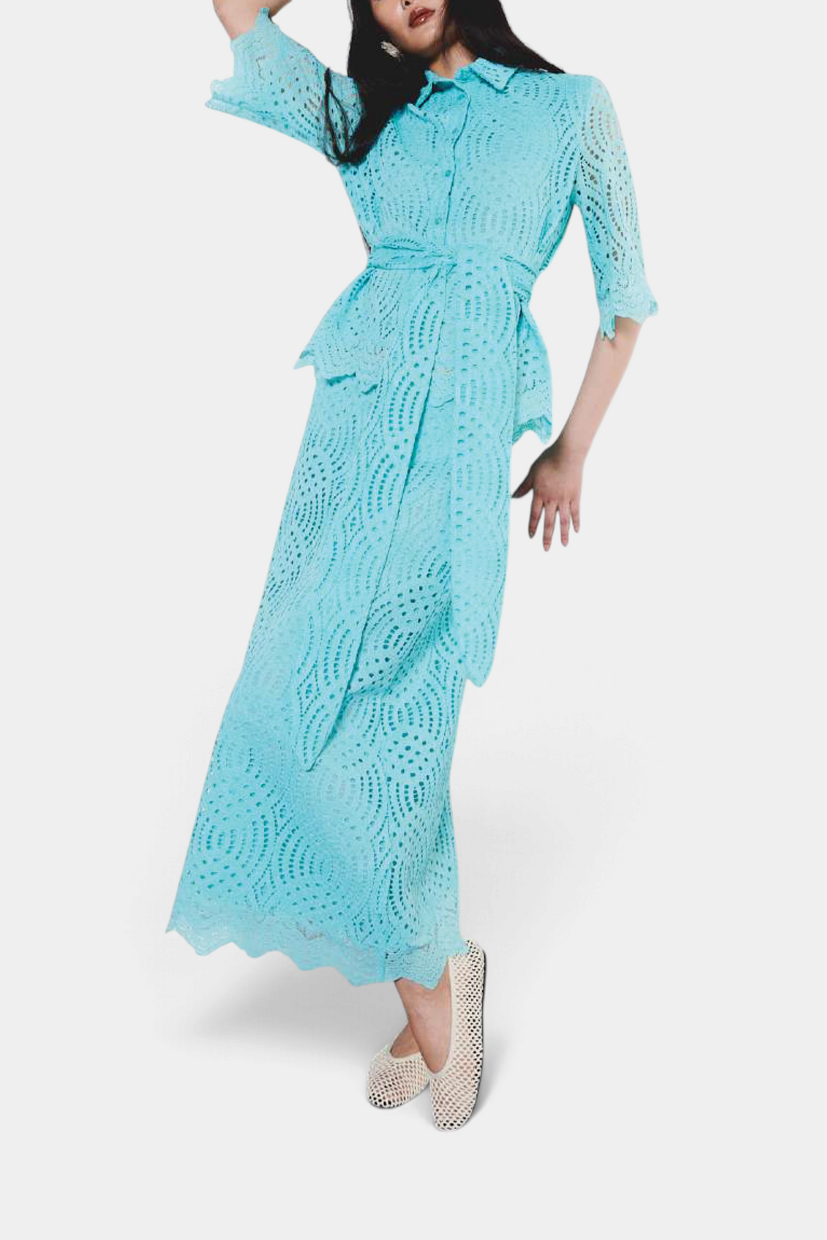 The Copper Shed aqua blue eyelet lace collared blouse with tie waist worn by a model