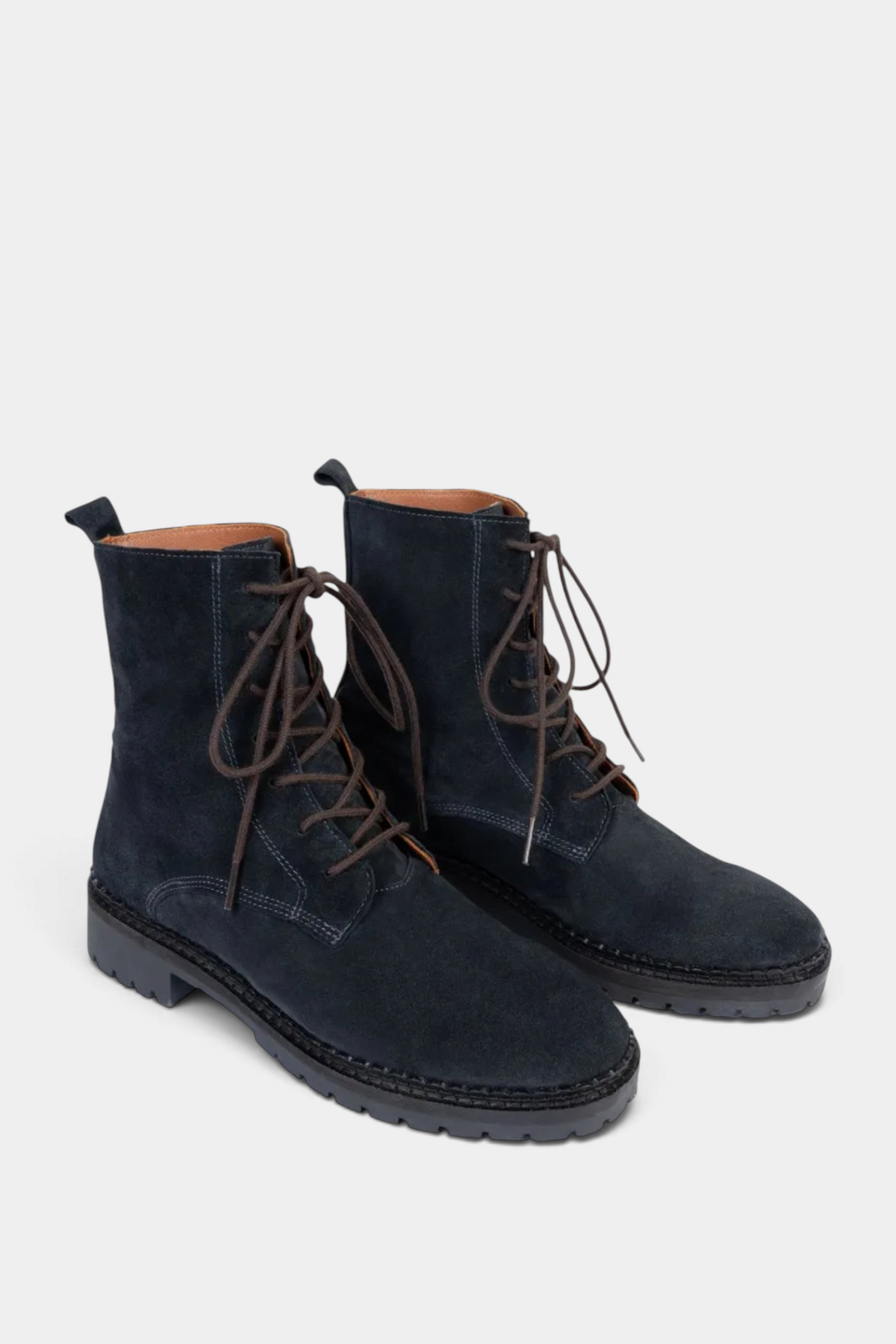 The Copper Shed Bartholomew navy split suede lace-up boots with brown laces and a scalloped rubber tread sole.