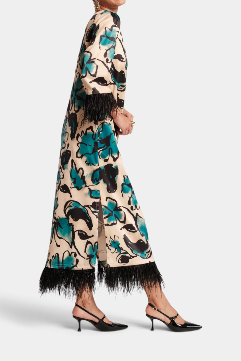 The Copper Shed Belle Maxi dress in Abstract Meadow print with black faux-feather trim on sleeves and side-slit hem.
