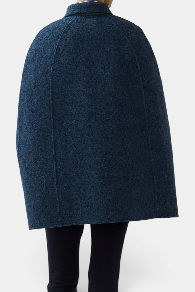 The Copper Shed Bennet tailored cape in dark blue herringbone Harris Tweed wool, shown from the back.
