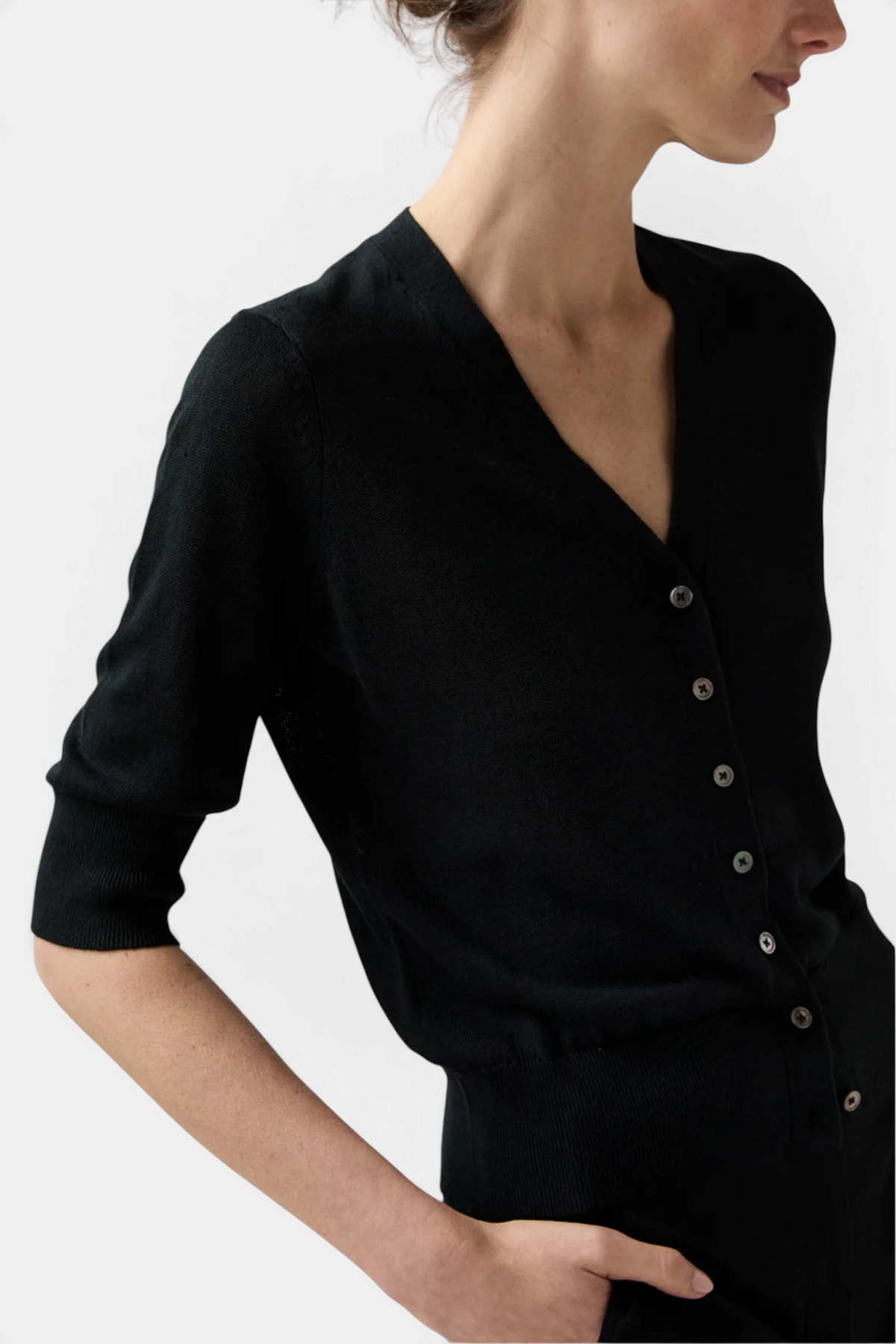 The Copper Shed black short-sleeved Rosie V-neck cardigan in French linen with mother-of-pearl buttons