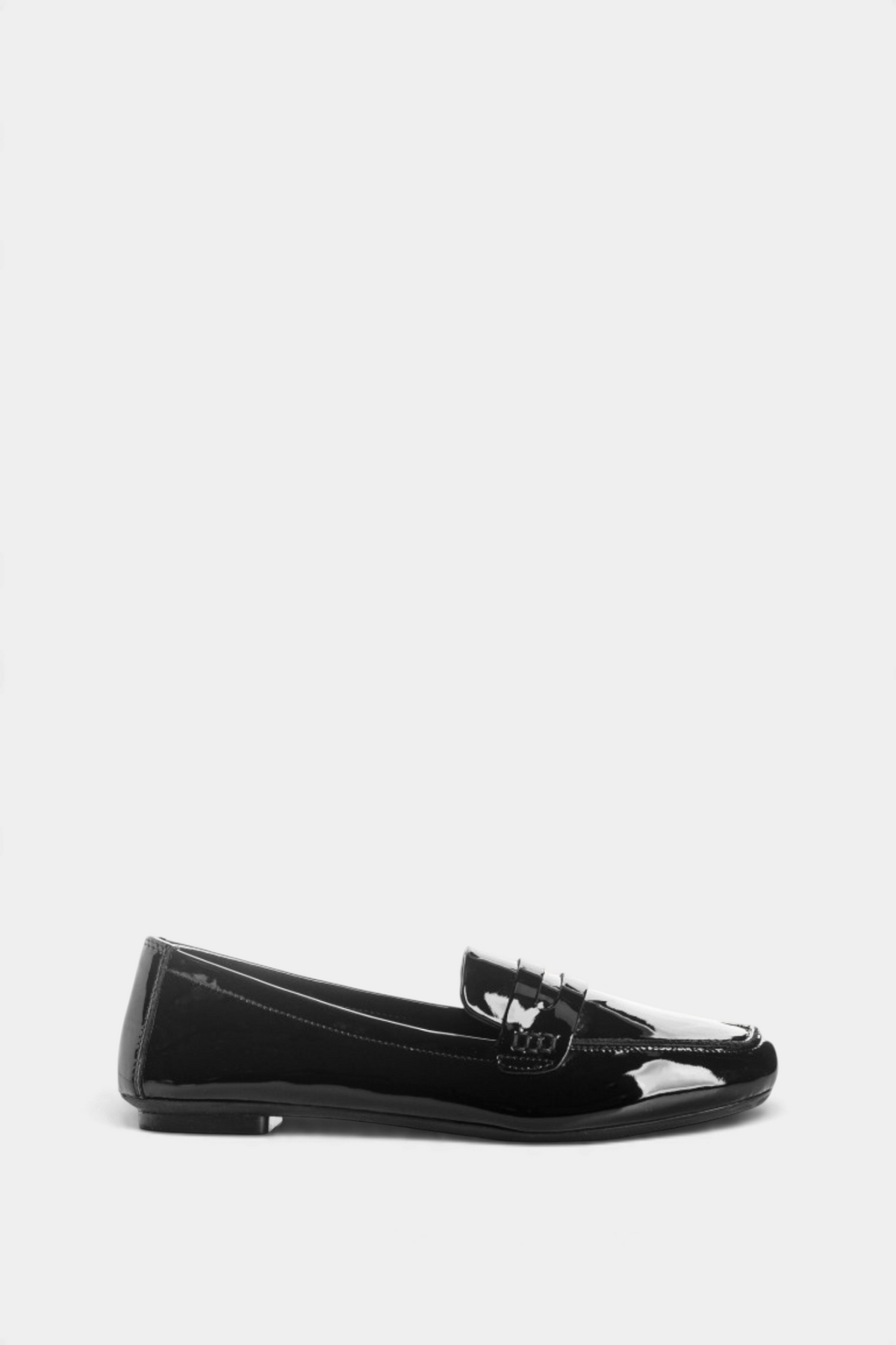 The Copper Shed Hema black patent leather loafers with a square toe, low heel, and classic stitch detailing.