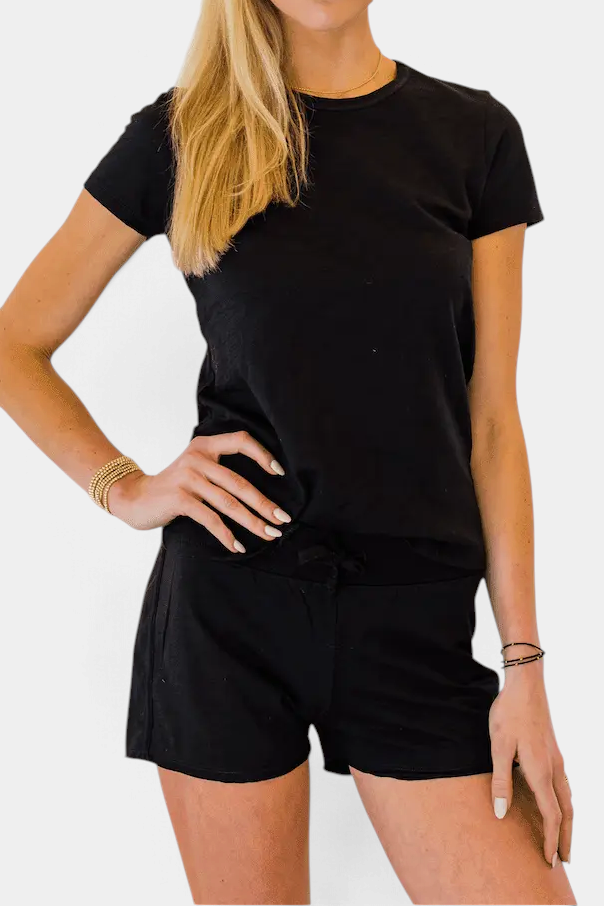 The Copper Shed black Pima cotton lounge shorts featuring a flattering raw edge trim and a comfortable slender fit.