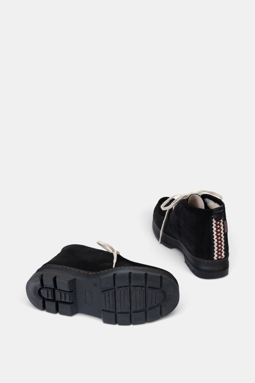 The Copper Shed Phenomenal black suede shearling-lined boots with ecru laces and folk trim detail on the heel