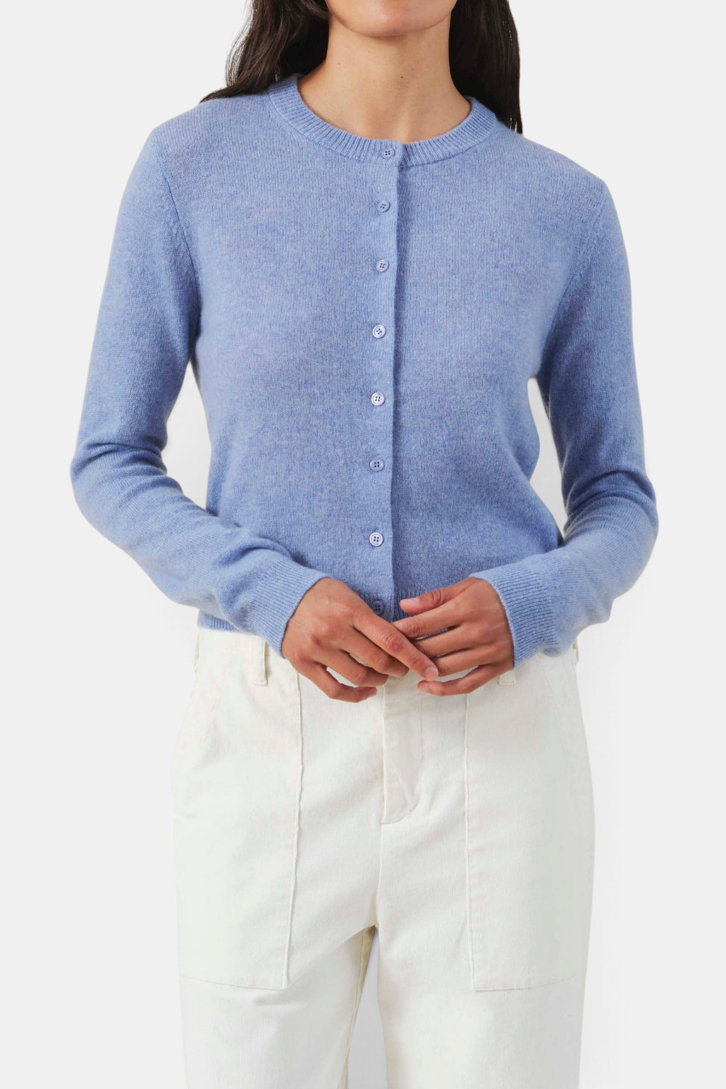 The Copper Shed Aylina light blue cashmere cardigan with crew neck and self-covered button front.