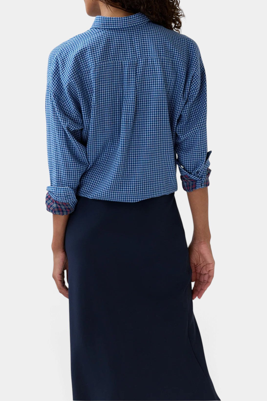The Copper Shed Weekender Shirt in blue Japanese double-weave cotton with a point collar and rolled cuffs, back view.