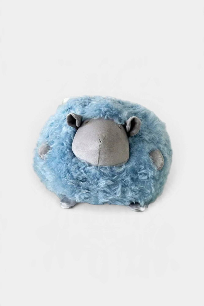 The Copper Shed plush curly sheep made from soft blue Mongolian lambskin with grey ultra-suede face and feet.