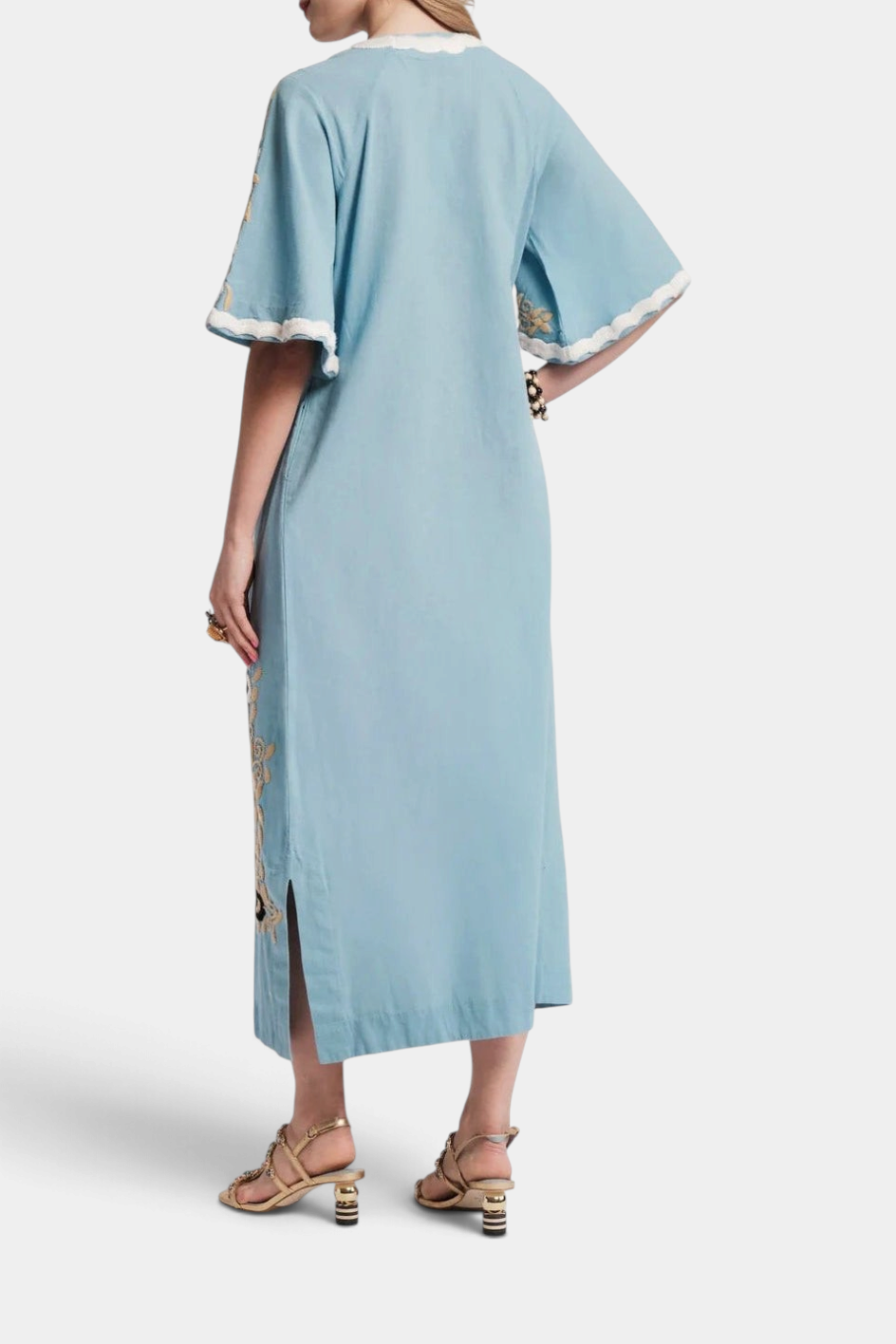 The Copper Shed light blue cotton maxi caftan with bell sleeves and intricate embroidery, shown from the back view.