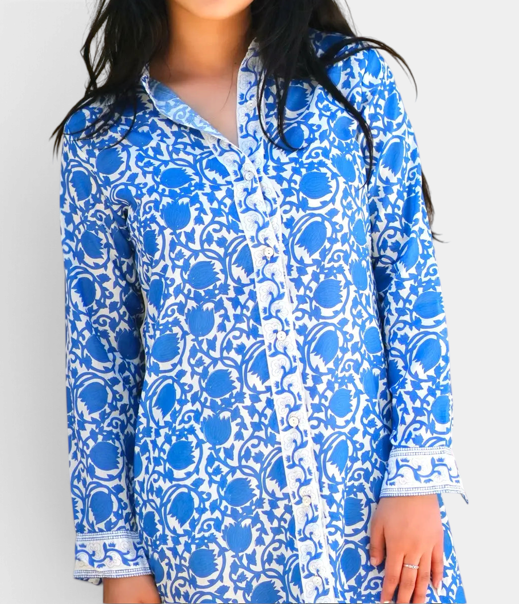 The Copper Shed Adriana long sleeve cotton shirt dress in blue and white floral print with a button-down front.