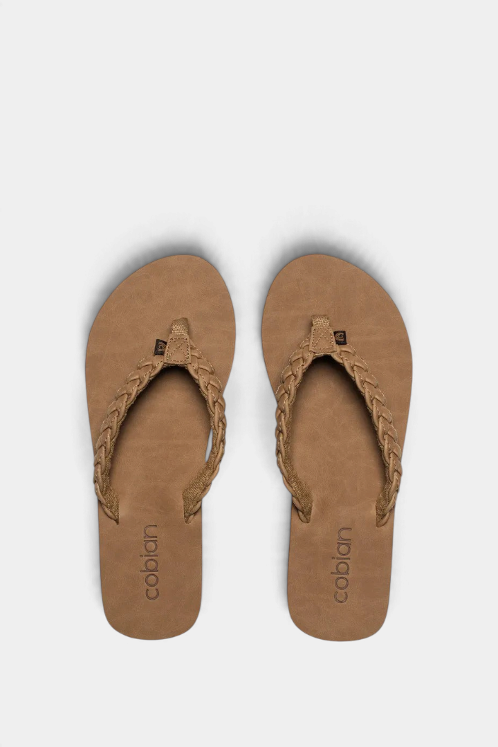 The Copper Shed Braided Pacifica flip flops in tan with synthetic leather braided straps and arch support footbed.
