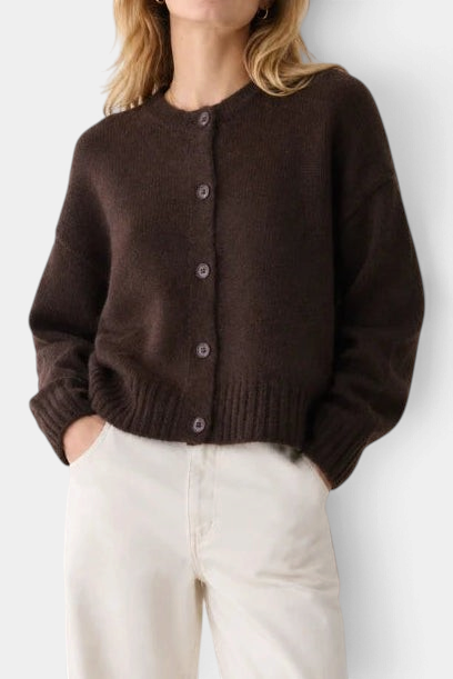 The Copper Shed boxy brown merino wool and cashmere cardigan with crew neck, ribbed trim, and tonal button closure.