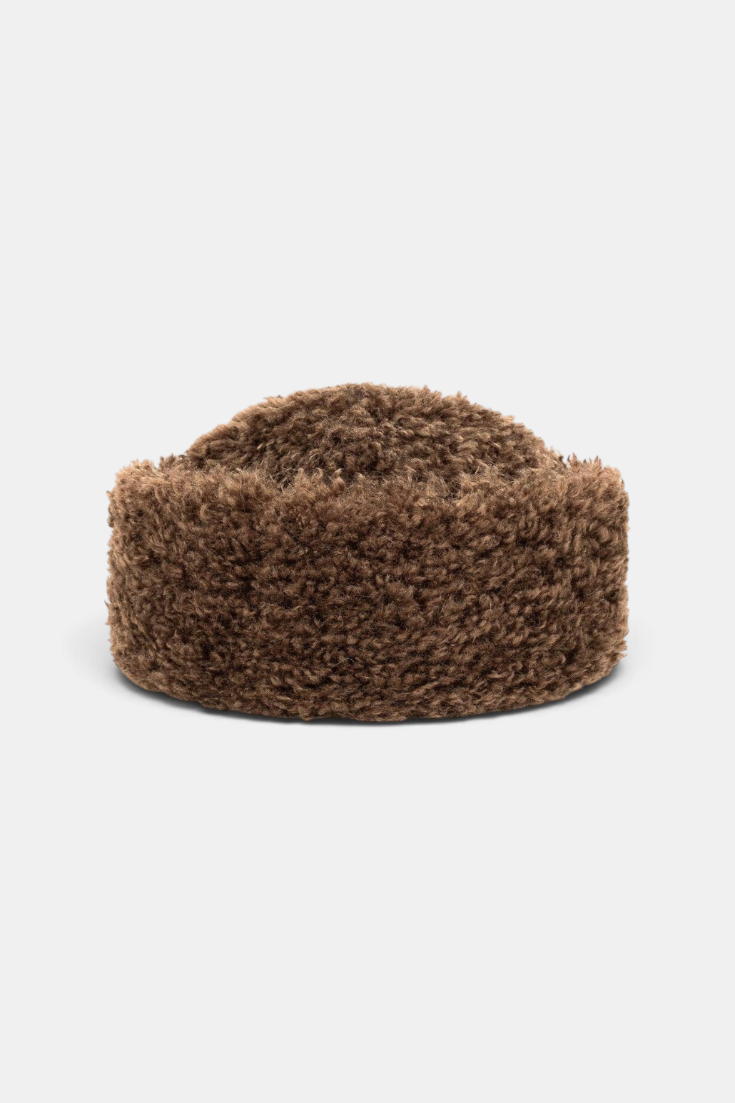 The Copper Shed brown faux sheepskin sherpa hat with a deep brim and textured winter style