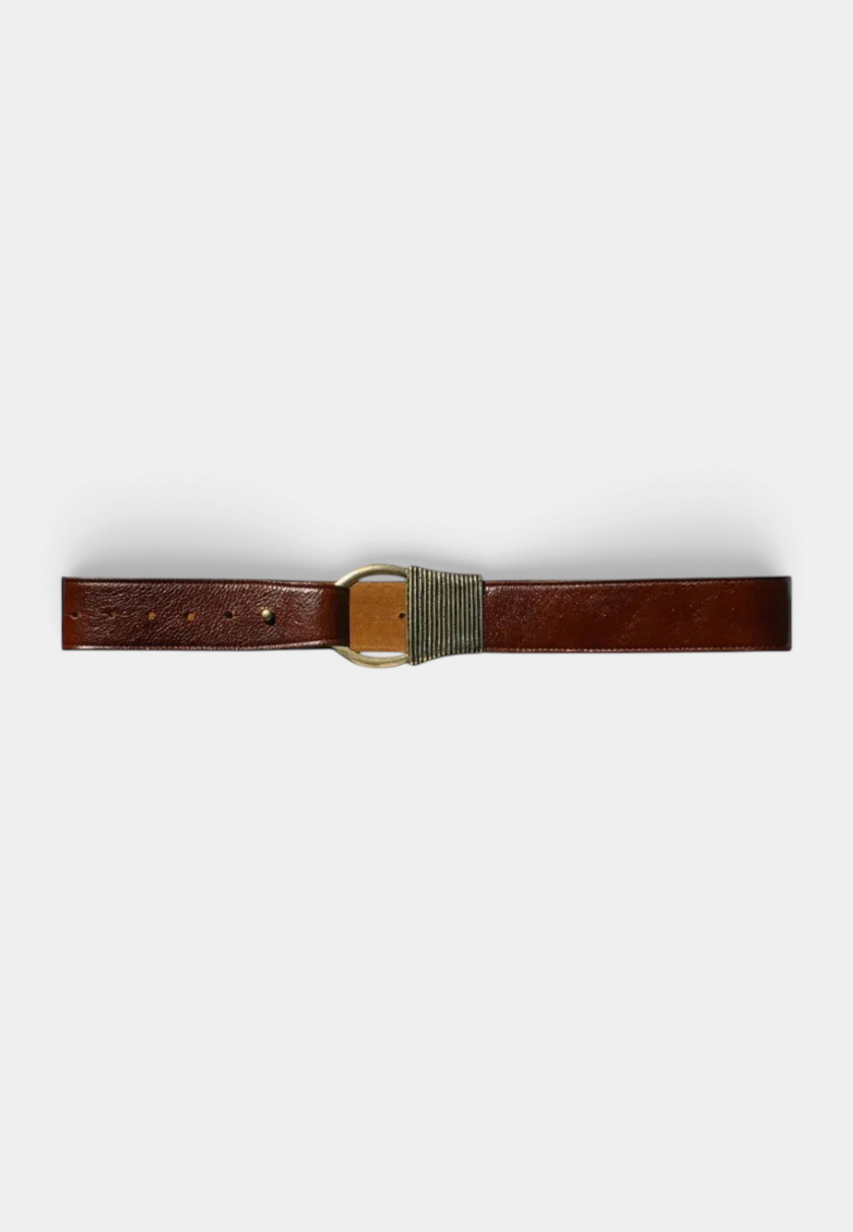 The Copper Shed Cast Rope Belt in dark brown leather featuring a unique metallic ring buckle and ribbed detail.