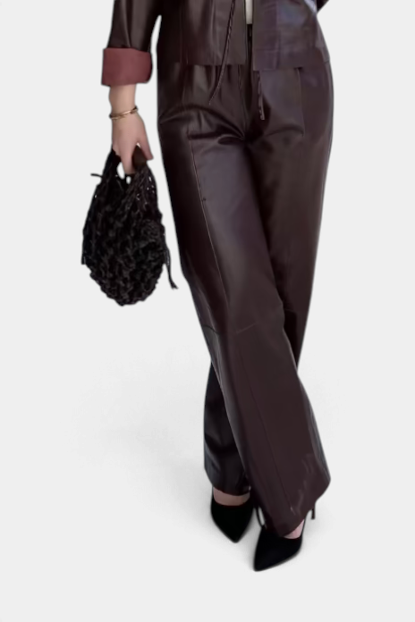 The Copper Shed Alysi dark brown genuine leather straight leg pants with an elasticated waist and side pockets.
