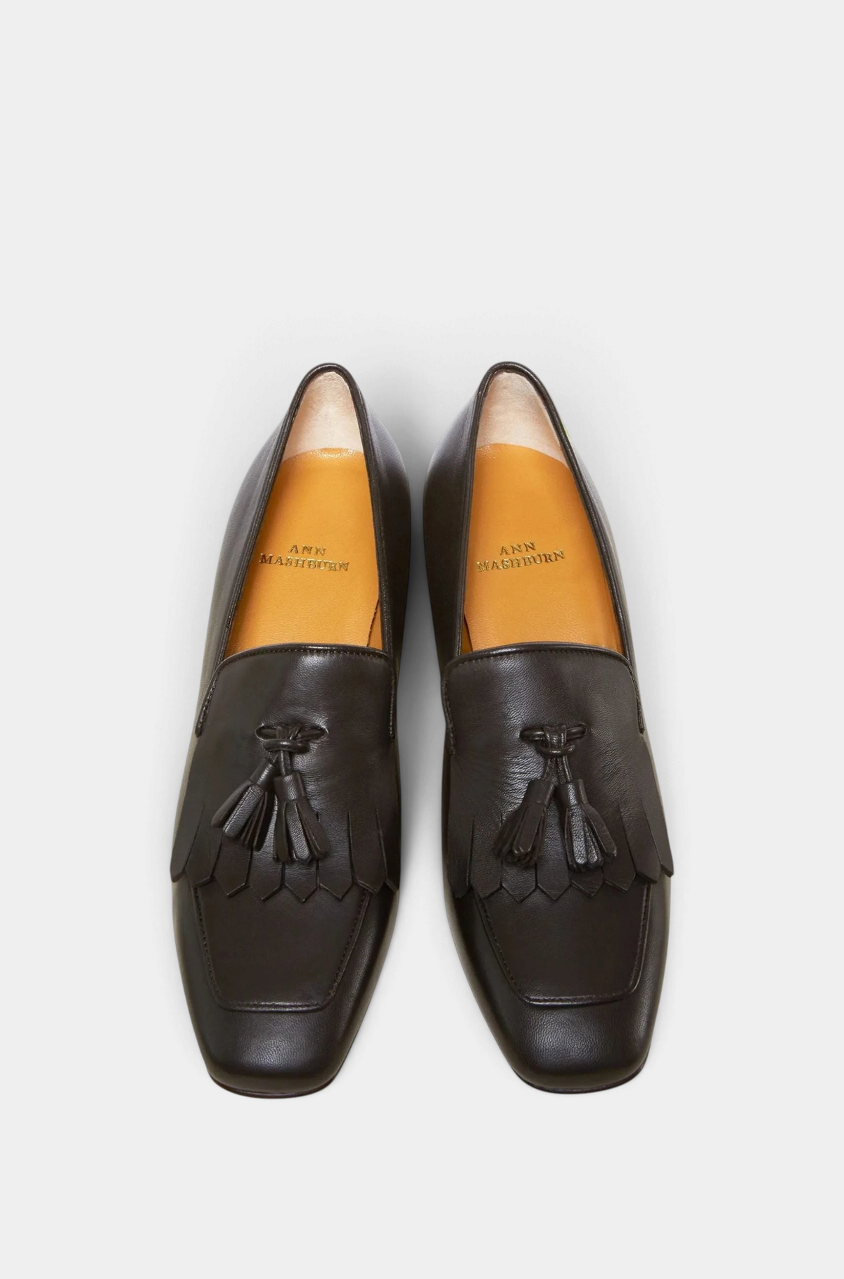 The Copper Shed Kilt Heel loafers in dark brown nappa leather with classic tassel detailing and a square toe