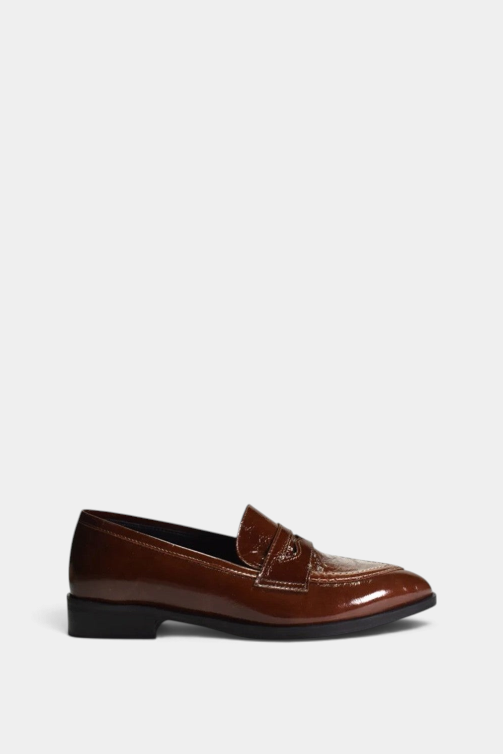 The Copper Shed Adrian pointy patent leather slip-on loafer in brown with a low rubber heel and padded footbed.