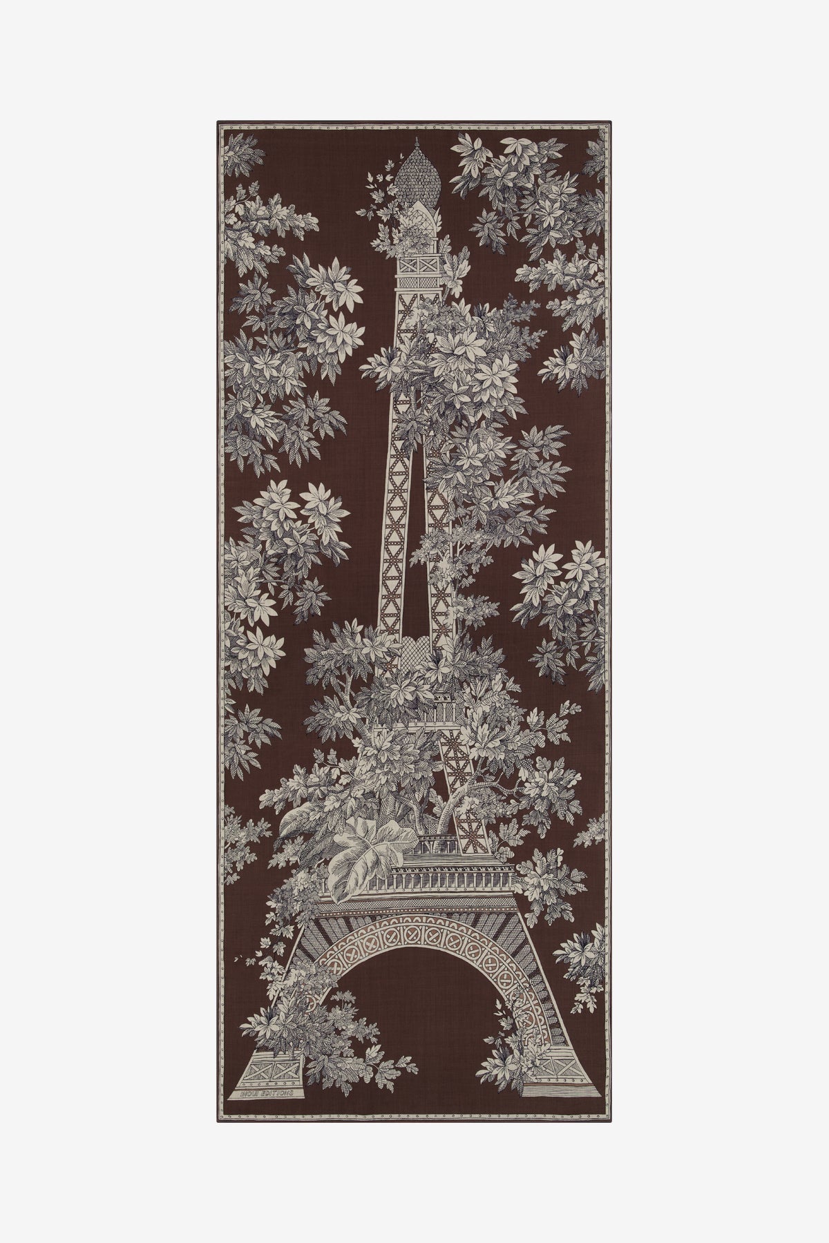 The Copper Shed brown wool scarf featuring a detailed white toile de jouy print of the Eiffel Tower and foliage.