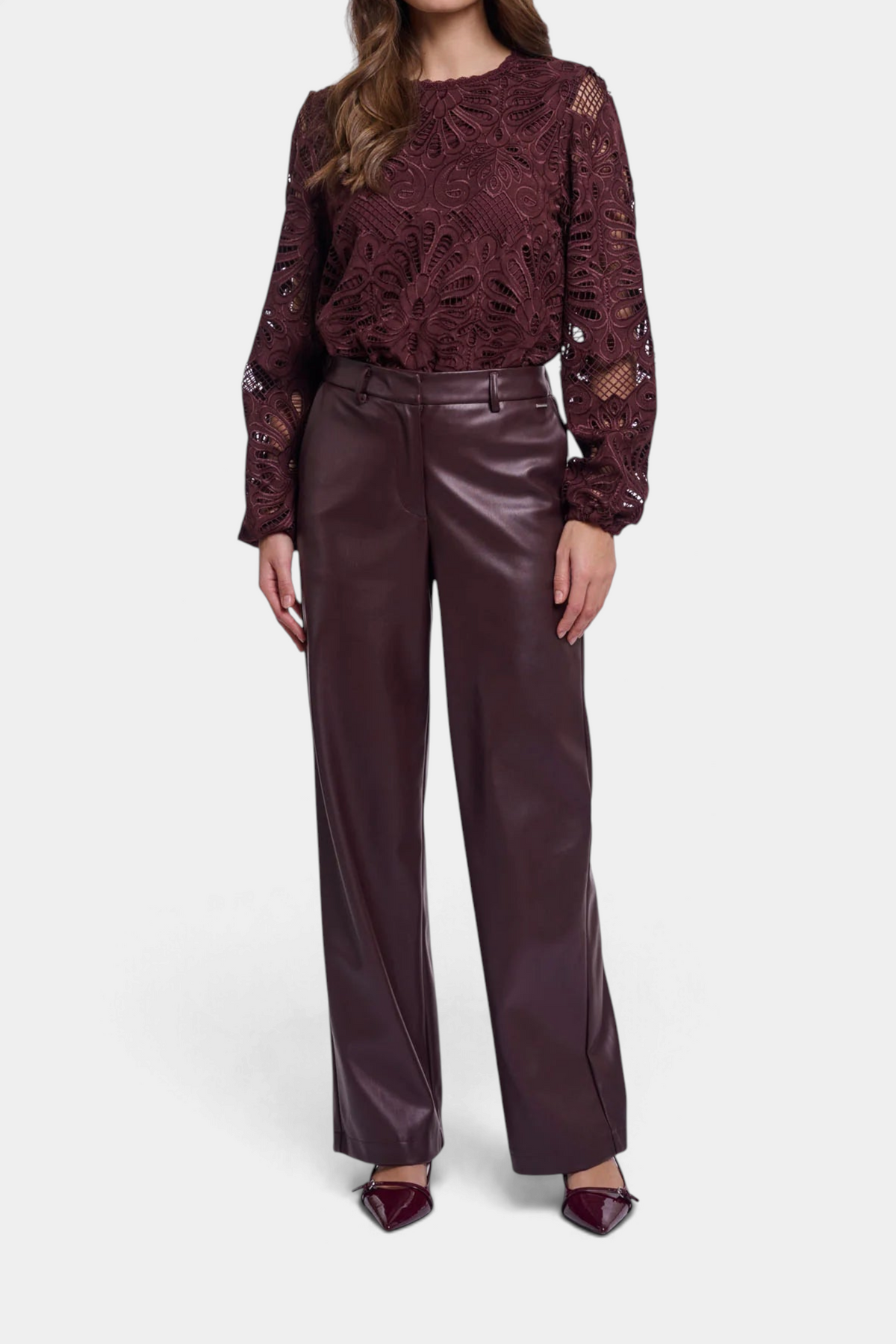 The Copper Shed Georgina straight-leg trousers in deep burgundy faux leather with an elasticated waistband.